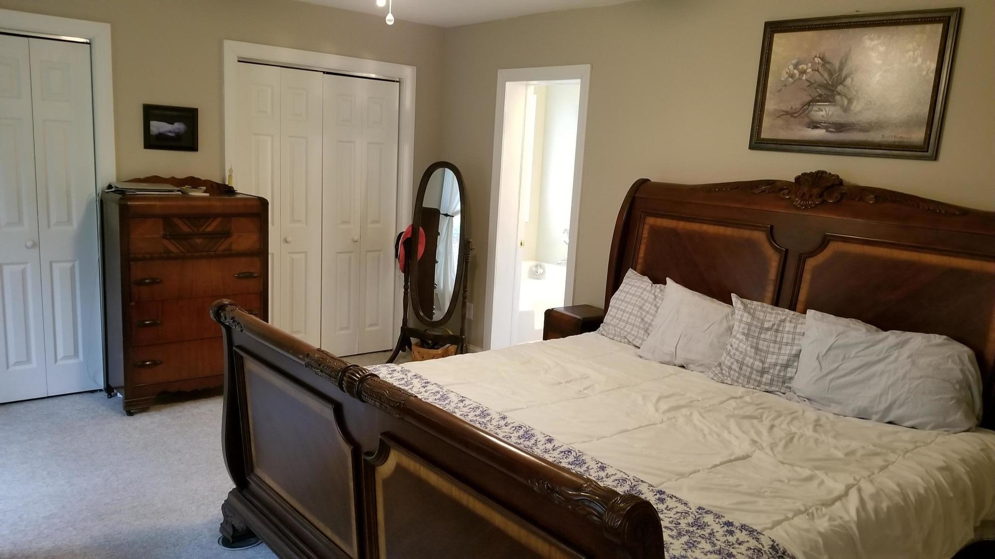 181 Silver Shadow Road Hardy, VA 24101 - Photo 11 of 47 a bedroom with a bed and a dresser