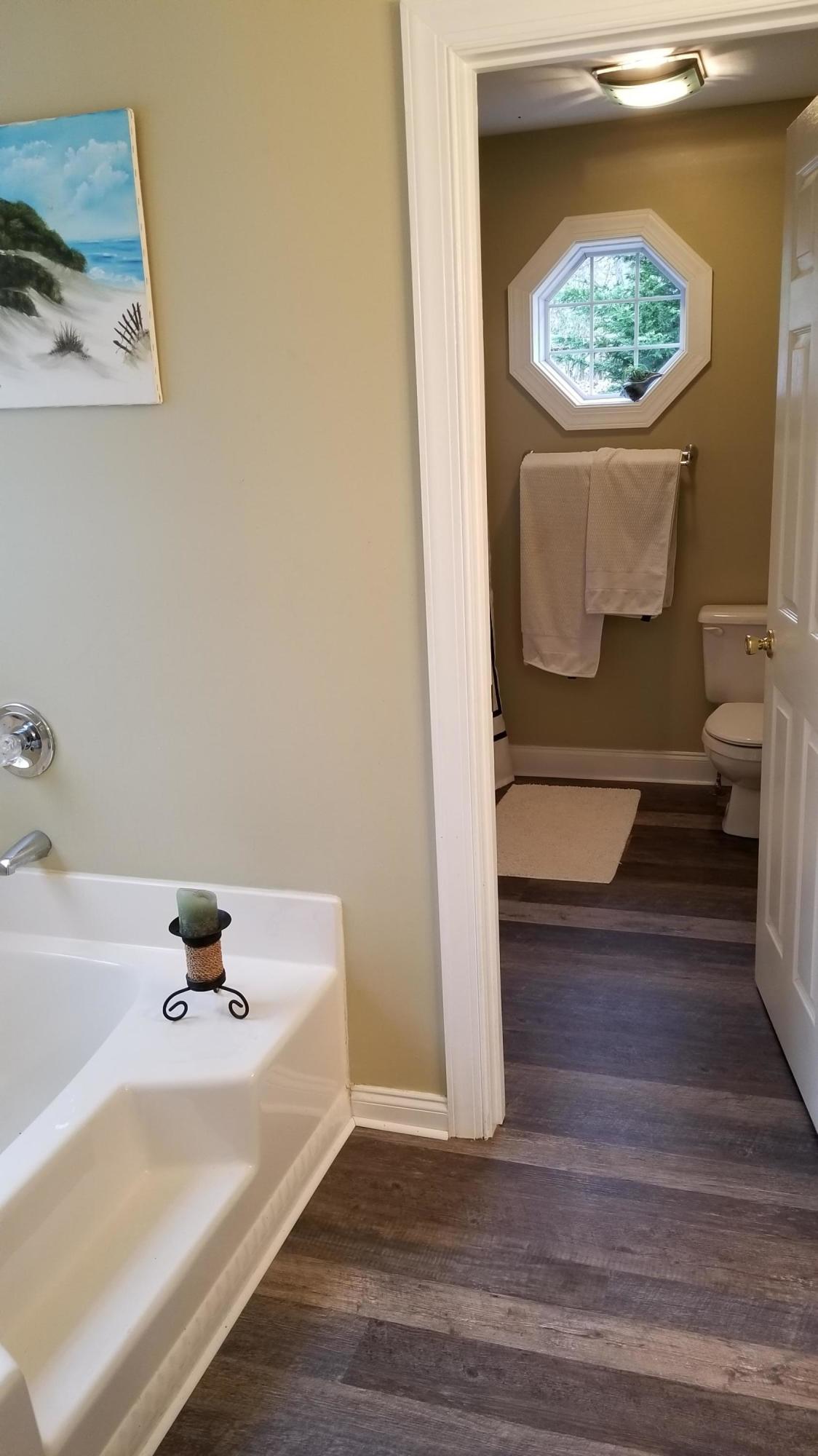 181 Silver Shadow Road Hardy, VA 24101 - Photo 14 of 47 a bathroom with a bathtub and sink