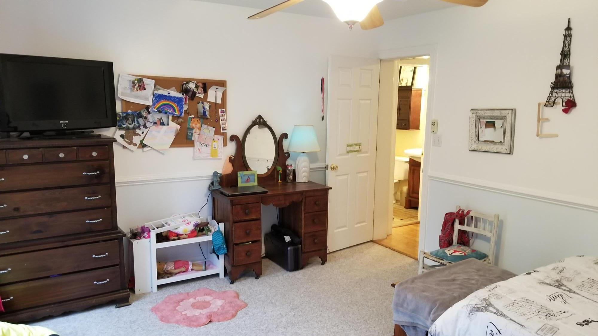 181 Silver Shadow Road Hardy, VA 24101 - Photo 20 of 47 a bedroom with a bed and flat screen tv