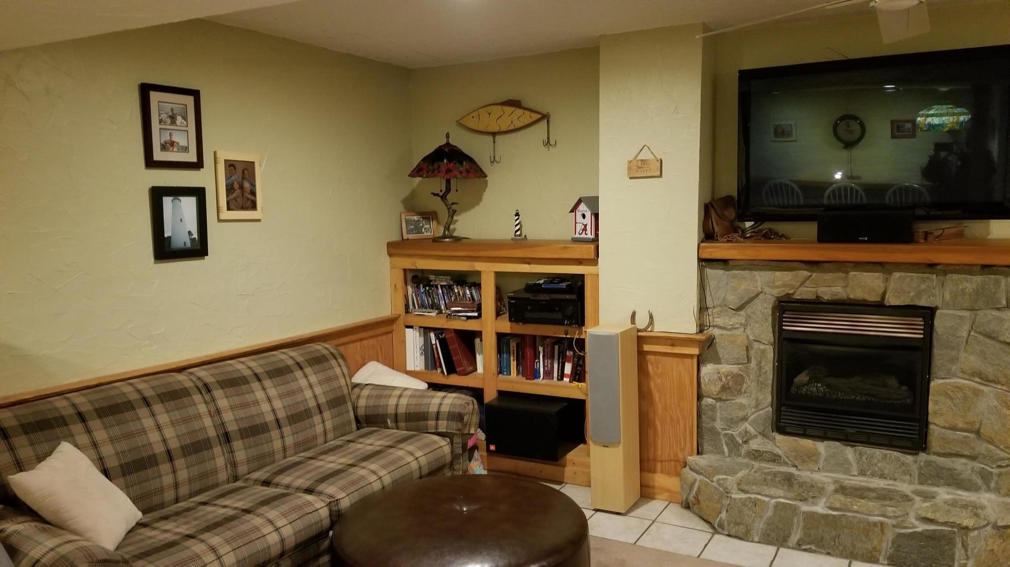 181 Silver Shadow Road Hardy, VA 24101 - Photo 25 of 47 a living room with furniture and a fireplace