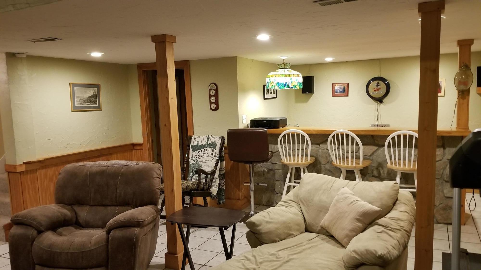 181 Silver Shadow Road Hardy, VA 24101 - Photo 27 of 47 a livingroom with furniture and kitchen view