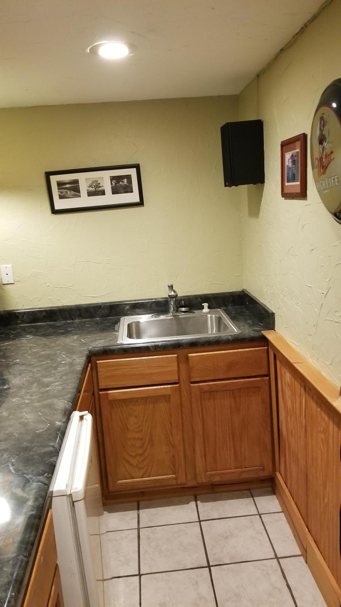 181 Silver Shadow Road Hardy, VA 24101 - Photo 28 of 47 a kitchen with stainless steel appliances granite countertop a sink and a microwave