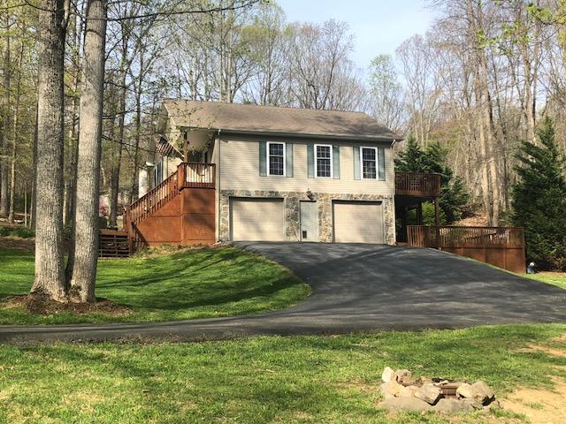 181 Silver Shadow Road Hardy, VA 24101 - Photo 31 of 47 a front view of a house with a yard