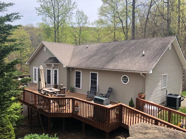 181 Silver Shadow Road Hardy, VA 24101 - Photo 34 of 47 a view of house with deck and outdoor seating