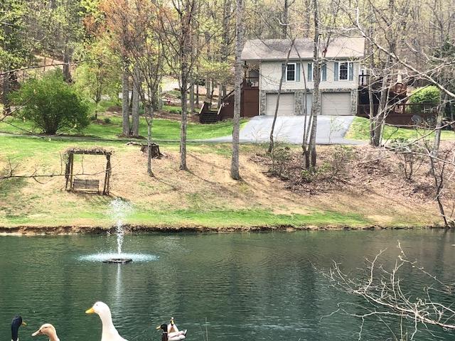 181 Silver Shadow Road Hardy, VA 24101 - Photo 39 of 47 a view of a lake with a house
