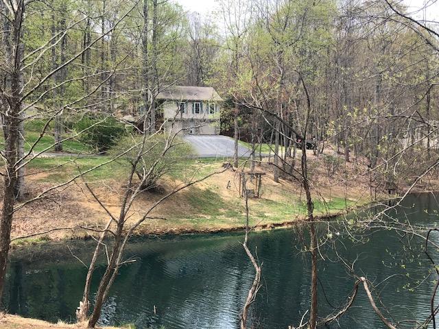 181 Silver Shadow Road Hardy, VA 24101 - Photo 42 of 47 a view of a lake in middle of the house
