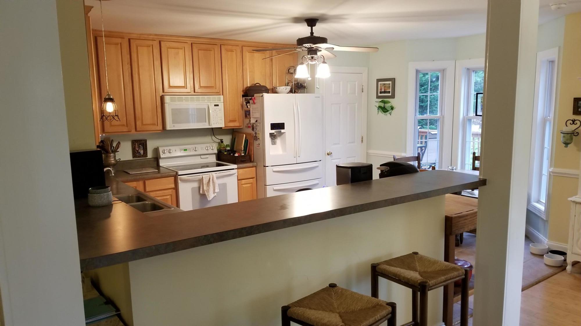 181 Silver Shadow Road Hardy, VA 24101 - Photo 6 of 47 a kitchen with stainless steel appliances a sink a stove and a refrigerator