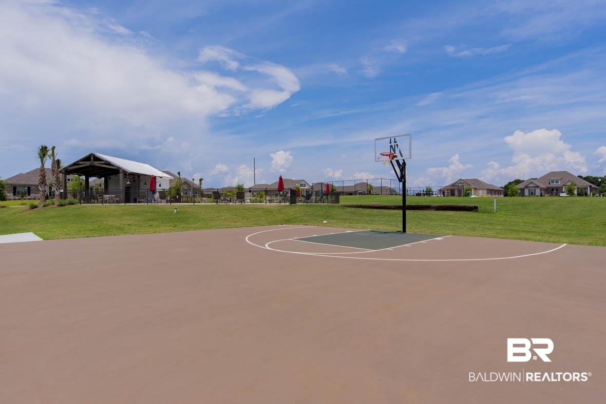 393 Garrison Boulevard Fairhope, AL 36532 - Photo 38 of 40 View of basketball court with a yard