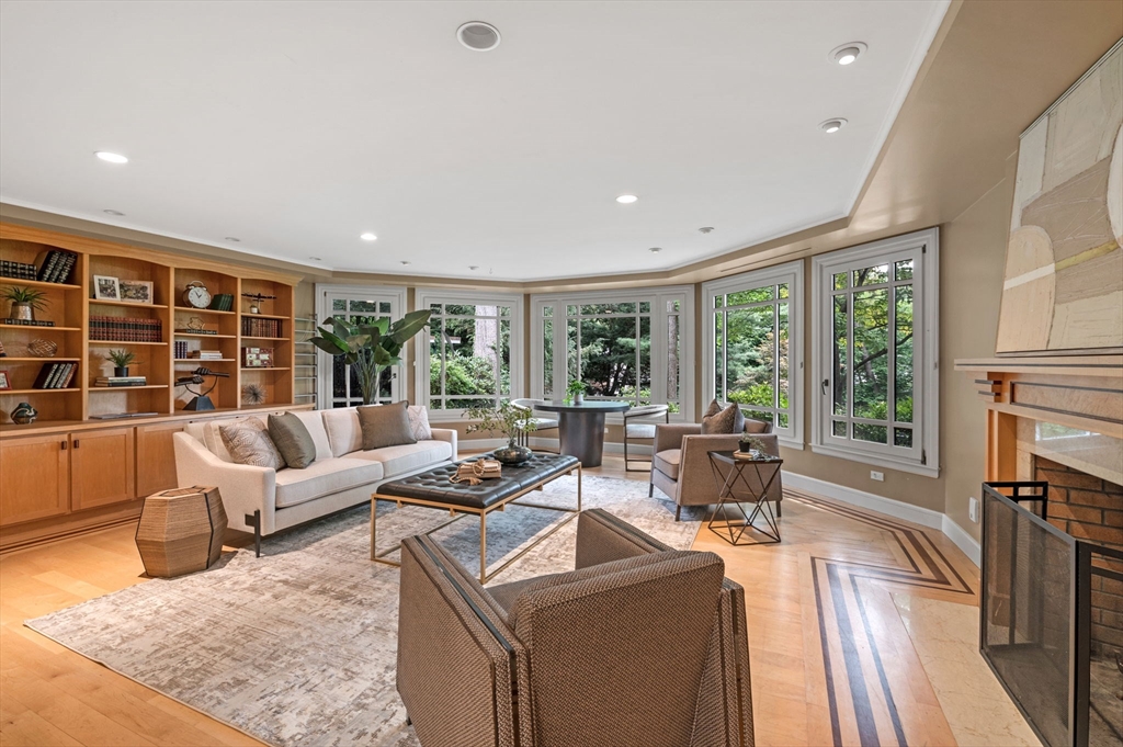 18 Hemlock Road Cambridge, MA 02138 - Photo 11 of 26 a living room with furniture and large windows