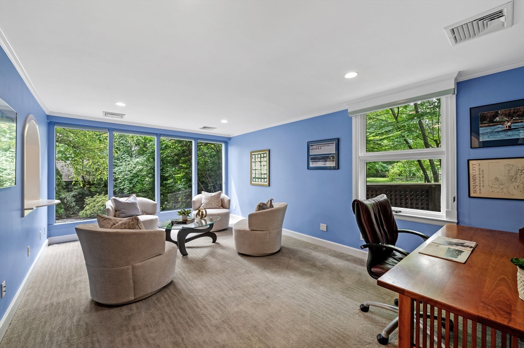 18 Hemlock Road Cambridge, MA 02138 - Photo 14 of 26 a living room with furniture and floor to ceiling windows