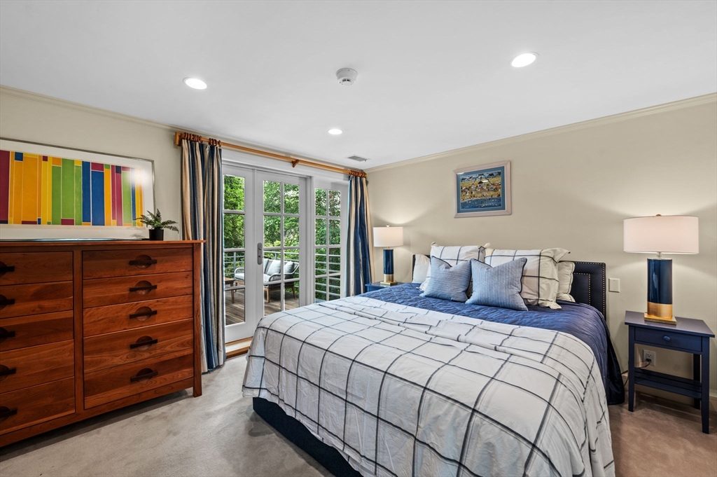 18 Hemlock Road Cambridge, MA 02138 - Photo 20 of 26 a bedroom with a large bed and a window