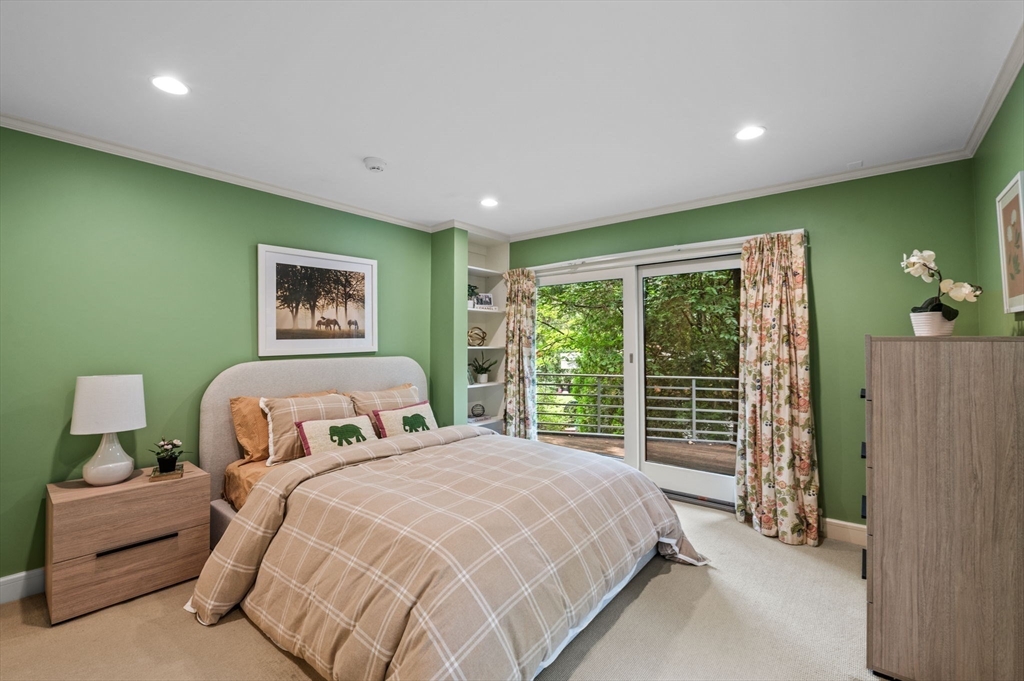 18 Hemlock Road Cambridge, MA 02138 - Photo 22 of 26 a bedroom with a large bed and a window