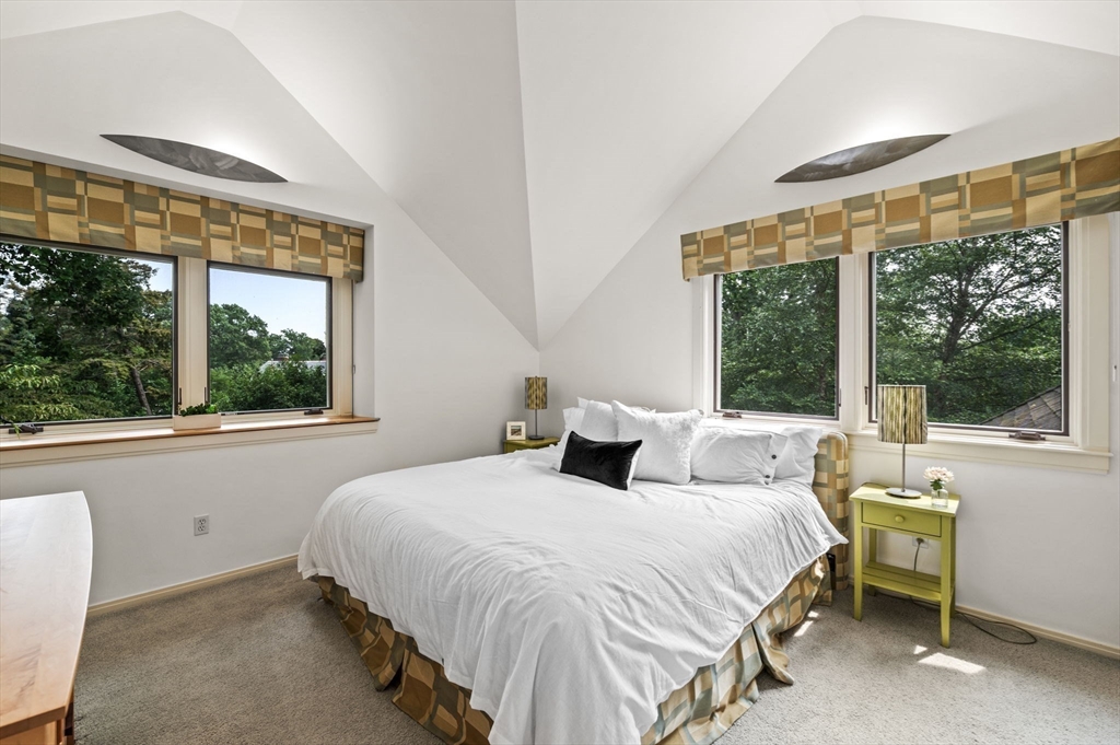 18 Hemlock Road Cambridge, MA 02138 - Photo 23 of 26 a bedroom with a bed and a large window