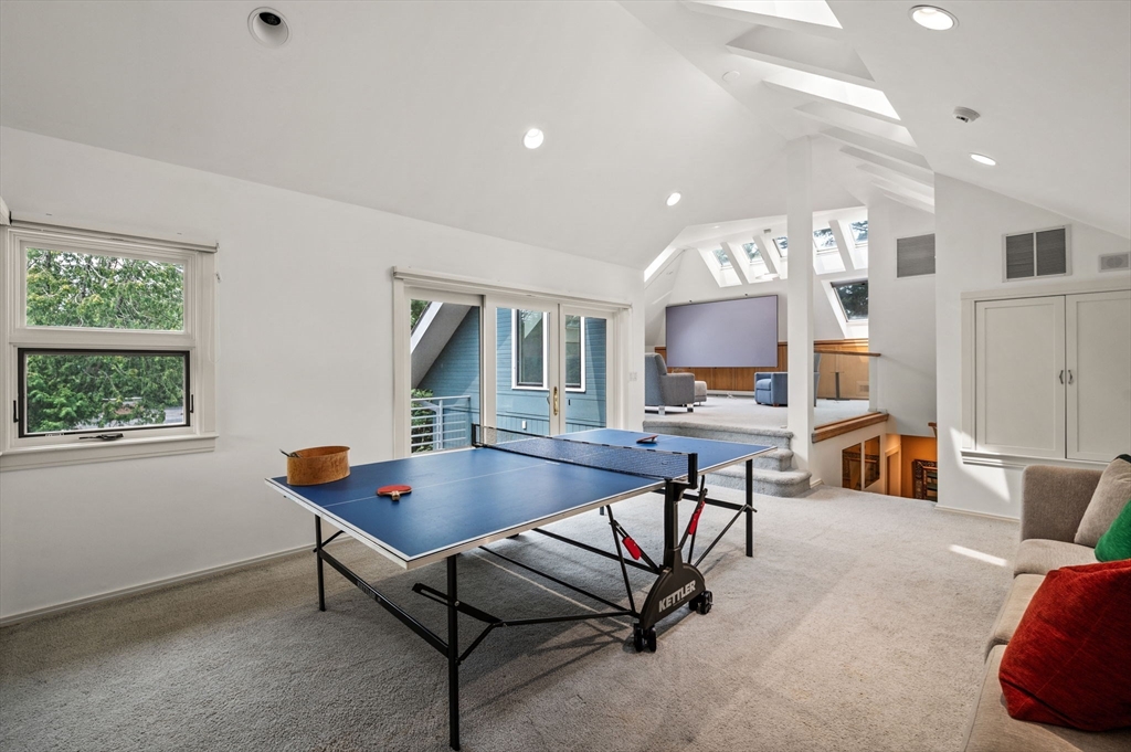 18 Hemlock Road Cambridge, MA 02138 - Photo 24 of 26 a living room with furniture and a table