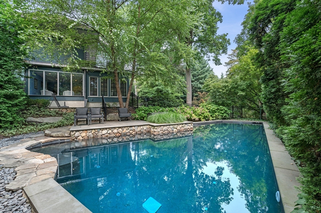 18 Hemlock Road Cambridge, MA 02138 - Photo 5 of 26 a view of a house with a yard