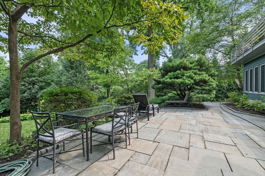 18 Hemlock Road Cambridge, MA 02138 - Photo 7 of 26 a view of backyard with seating area and green space