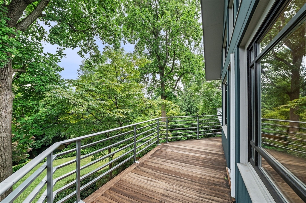 18 Hemlock Road Cambridge, MA 02138 - Photo 8 of 26 a view of balcony with floor to ceiling window with wooden floor