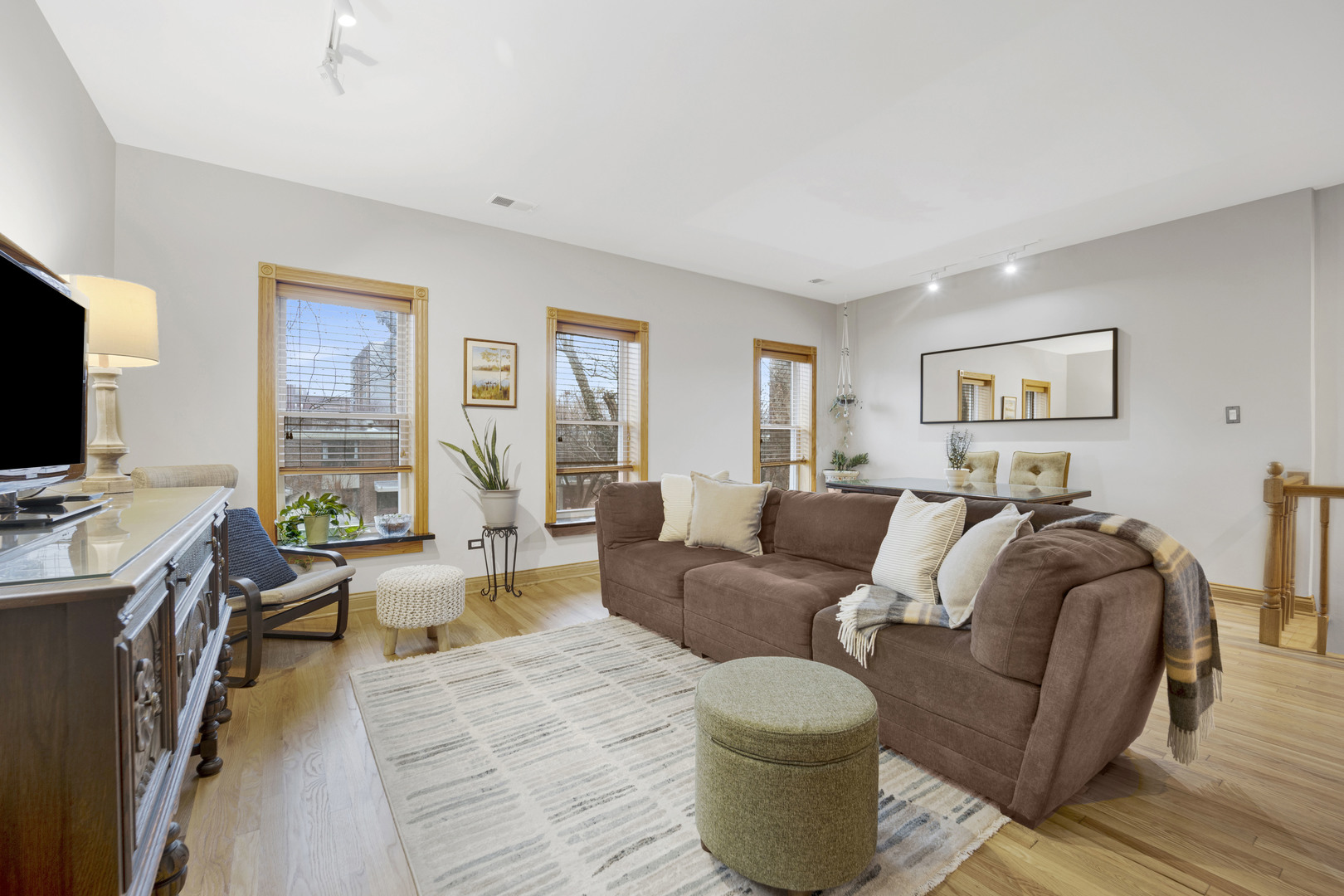 839 South Laflin Street, Unit 3 Chicago, IL 60607 - Photo 12 of 21 a living room with furniture and a flat screen tv
