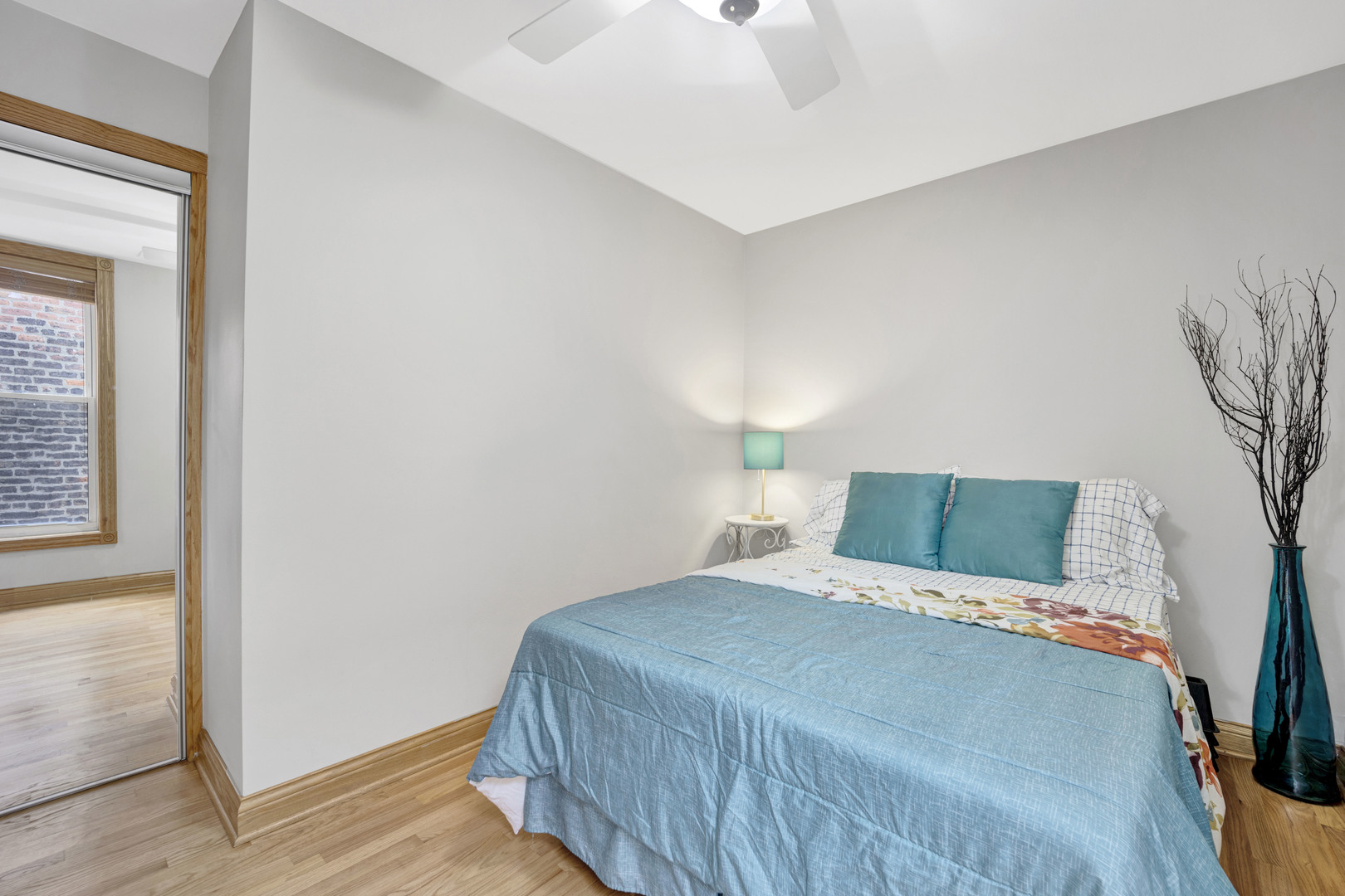 839 South Laflin Street, Unit 3 Chicago, IL 60607 - Photo 16 of 21 a bedroom with a bed and a window