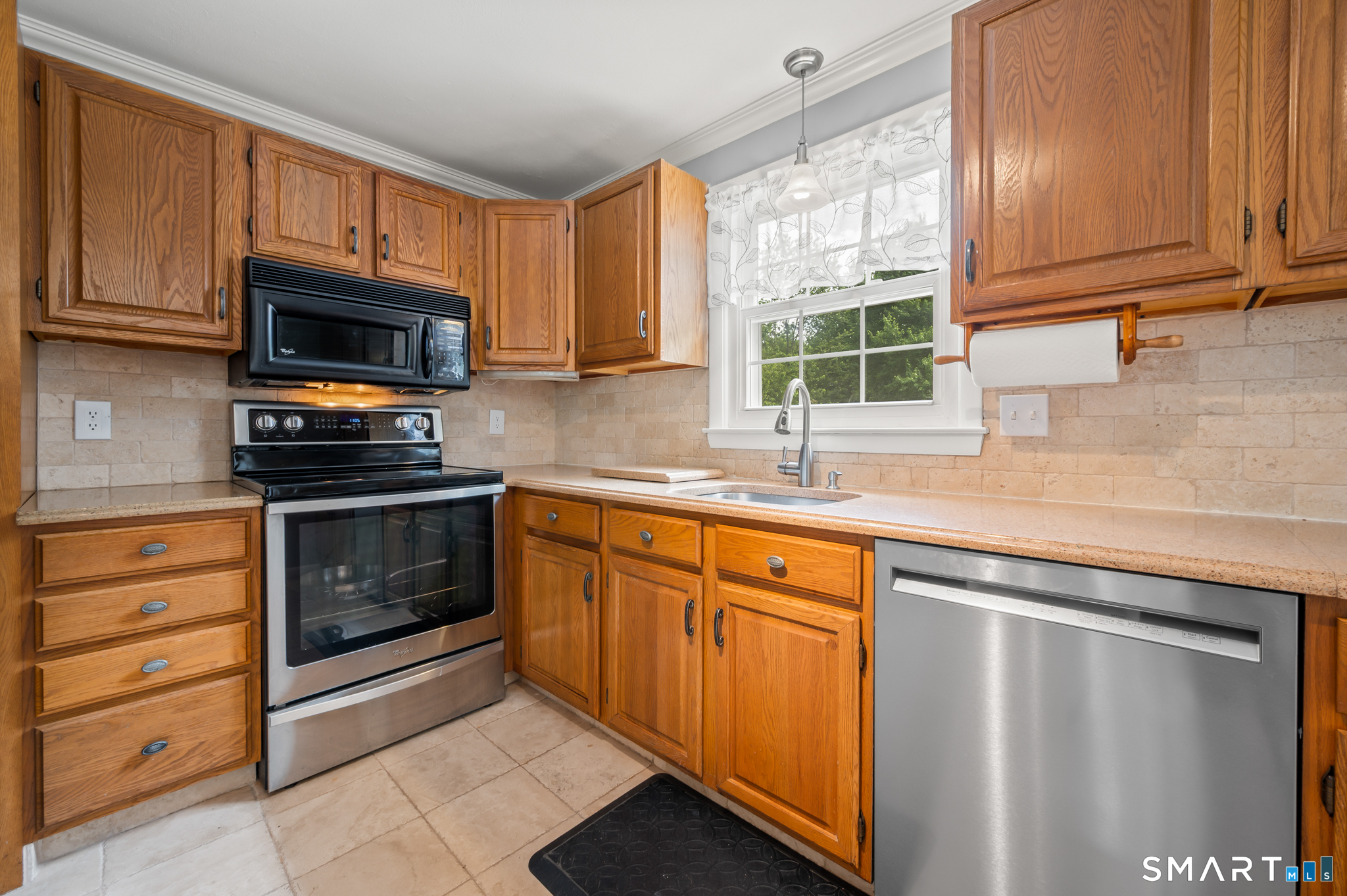 1611 Shepard Avenue Hamden, CT 06518 - Photo 10 of 31 a kitchen with granite countertop cabinets stainless steel appliances and a window