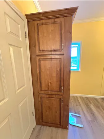 a view of an empty room with a window