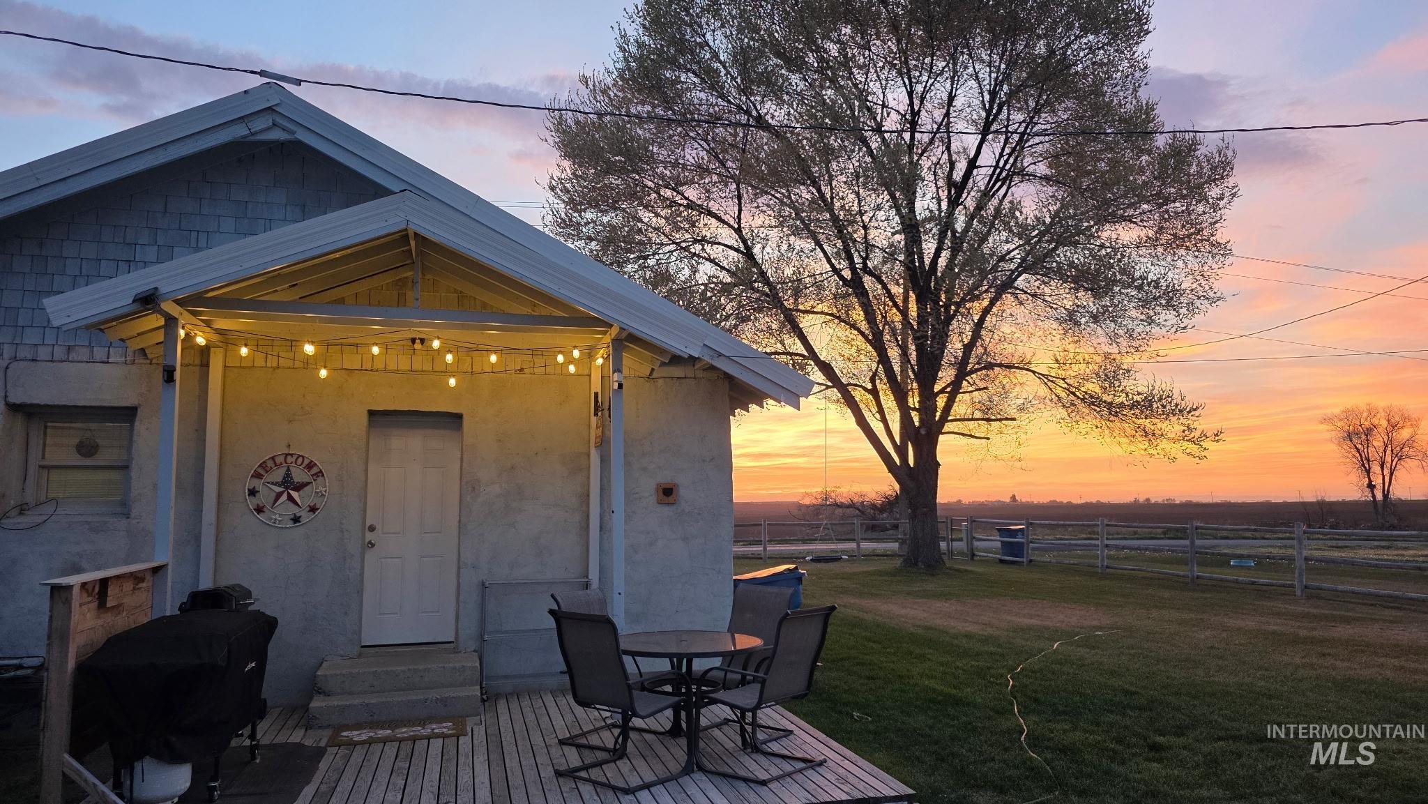 View of outbuilding with outdoor dining space