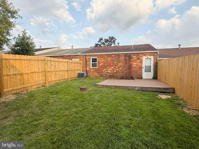 a view of a backyard with garden