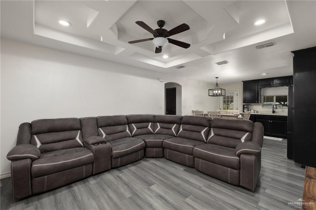 4204 Lott Road Donna, TX 78537 - Photo 3 of 15 a living room with furniture kitchen and a wooden floor