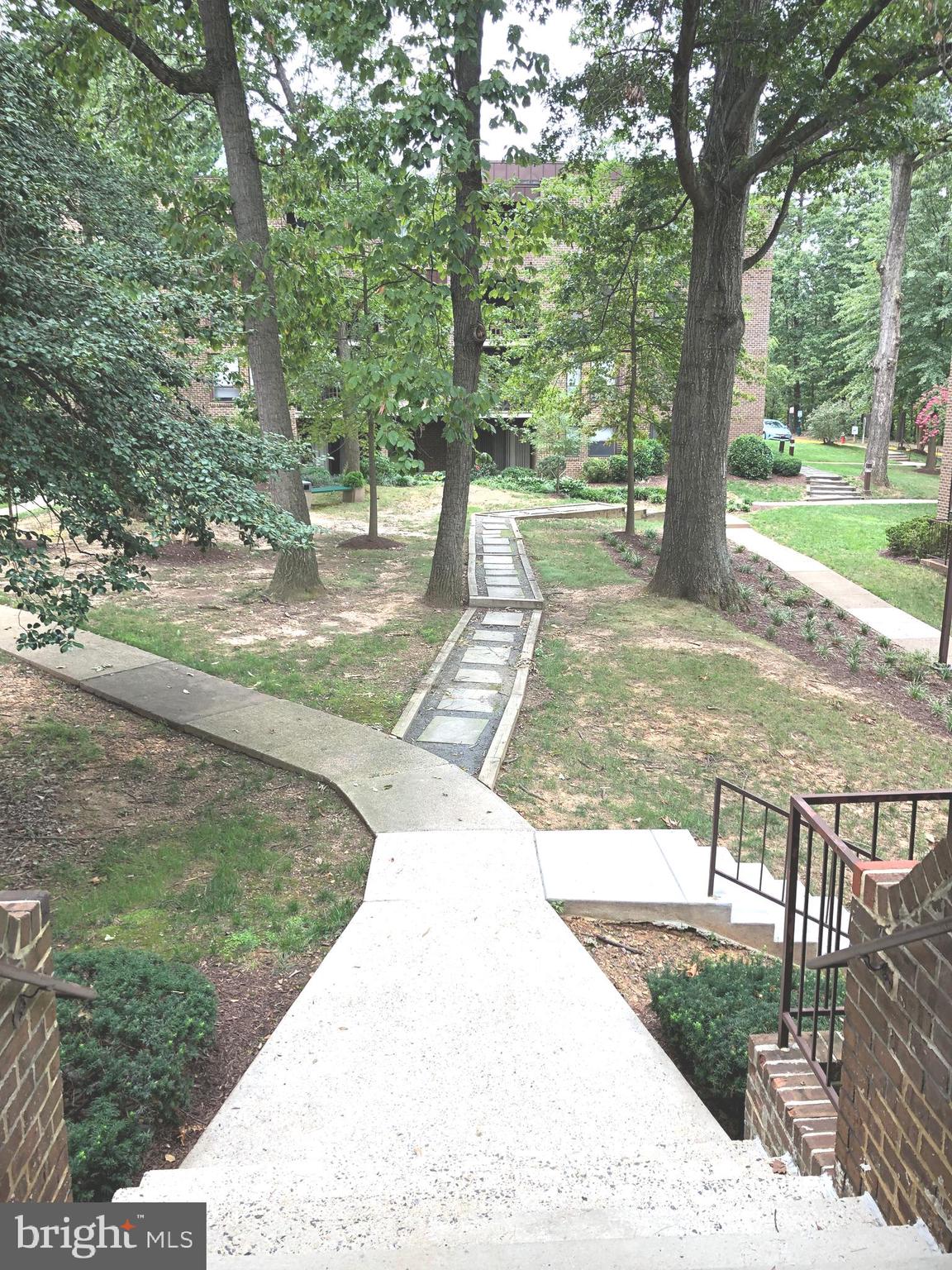 11232 Chestnut Grove Square, Unit 136 Reston, VA 20190 - Photo 3 of 36 Walking paths to Recreation and to Metro Rail