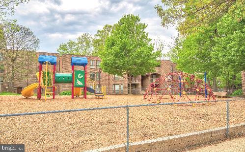 11232 Chestnut Grove Square, Unit 136 Reston, VA 20190 - Photo 9 of 36 Fenced Tot Lot