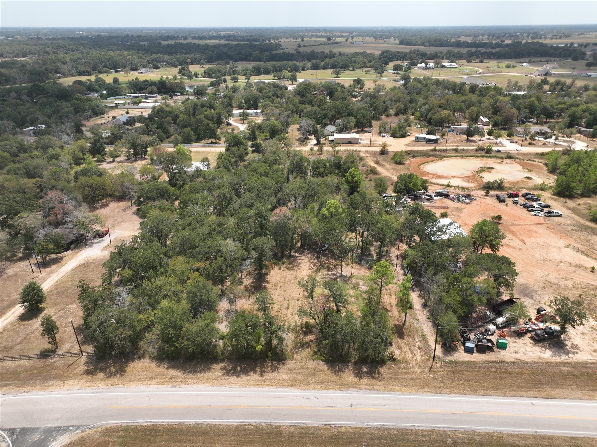 32687 Fm 1736 Road Hempstead, TX 77445 - Photo 10 of 16 an aerial view of residential building and parking space