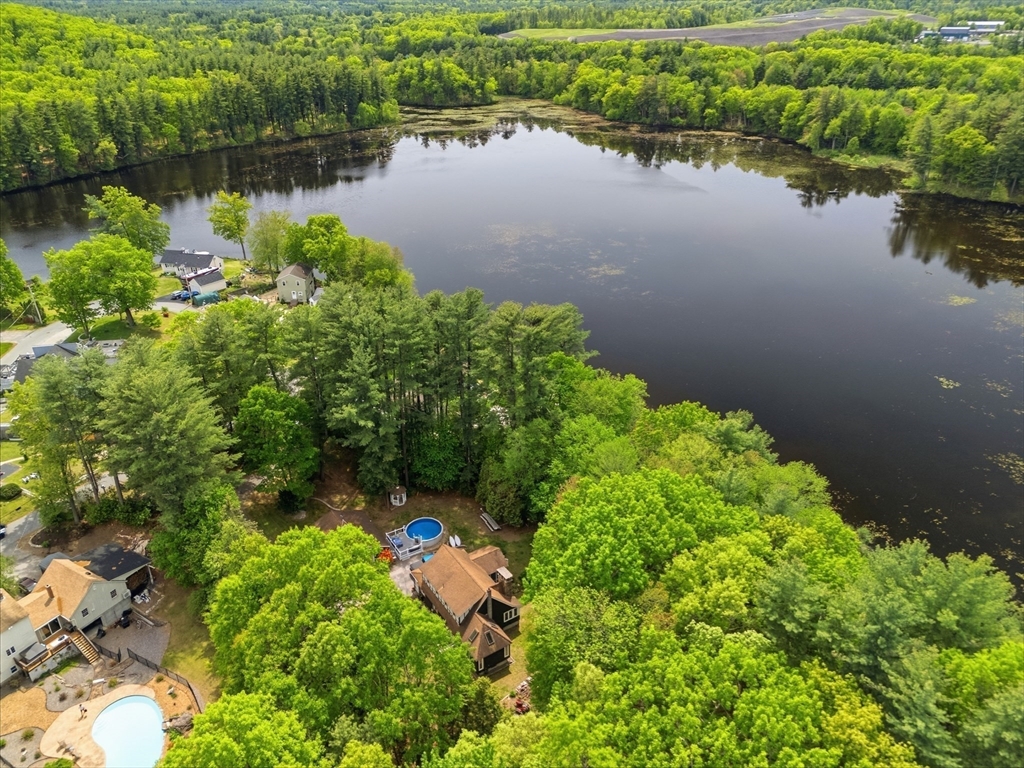 43 Flint Road Tyngsborough, MA 01879 - Photo 29 of 40 a view of a lake with a lake