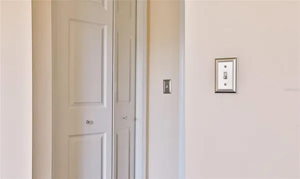 a view of a hallway with front door