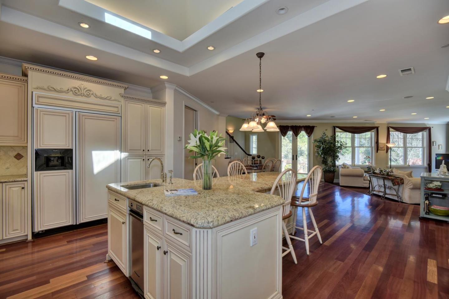 22219 Summit Road Los Gatos, CA 95033 - Photo 11 of 34 a kitchen with a table and chairs in it