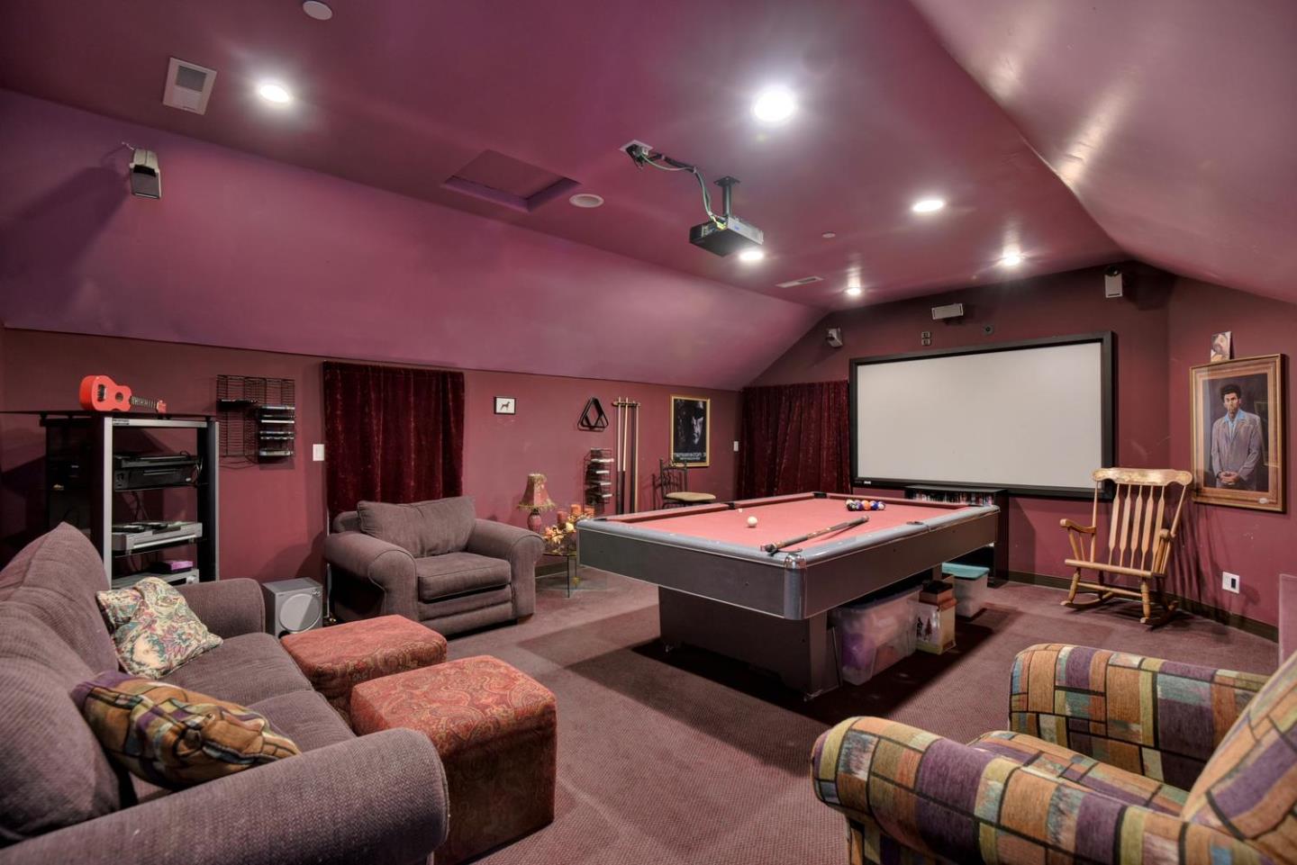 22219 Summit Road Los Gatos, CA 95033 - Photo 19 of 34 a living room with furniture a projector and a projector