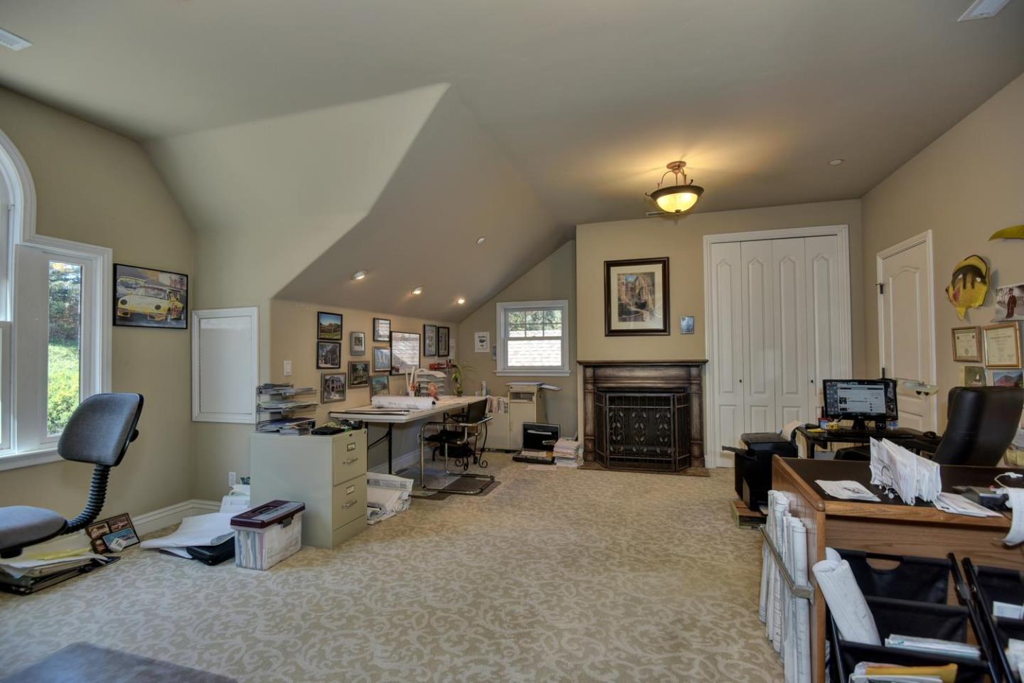 22219 Summit Road Los Gatos, CA 95033 - Photo 20 of 34 a view of a livingroom with furniture and a fireplace