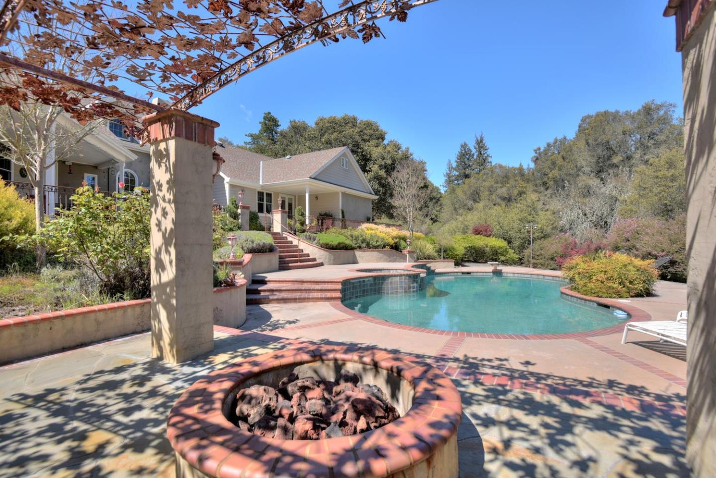22219 Summit Road Los Gatos, CA 95033 - Photo 22 of 34 a view of a house with a yard and sitting area