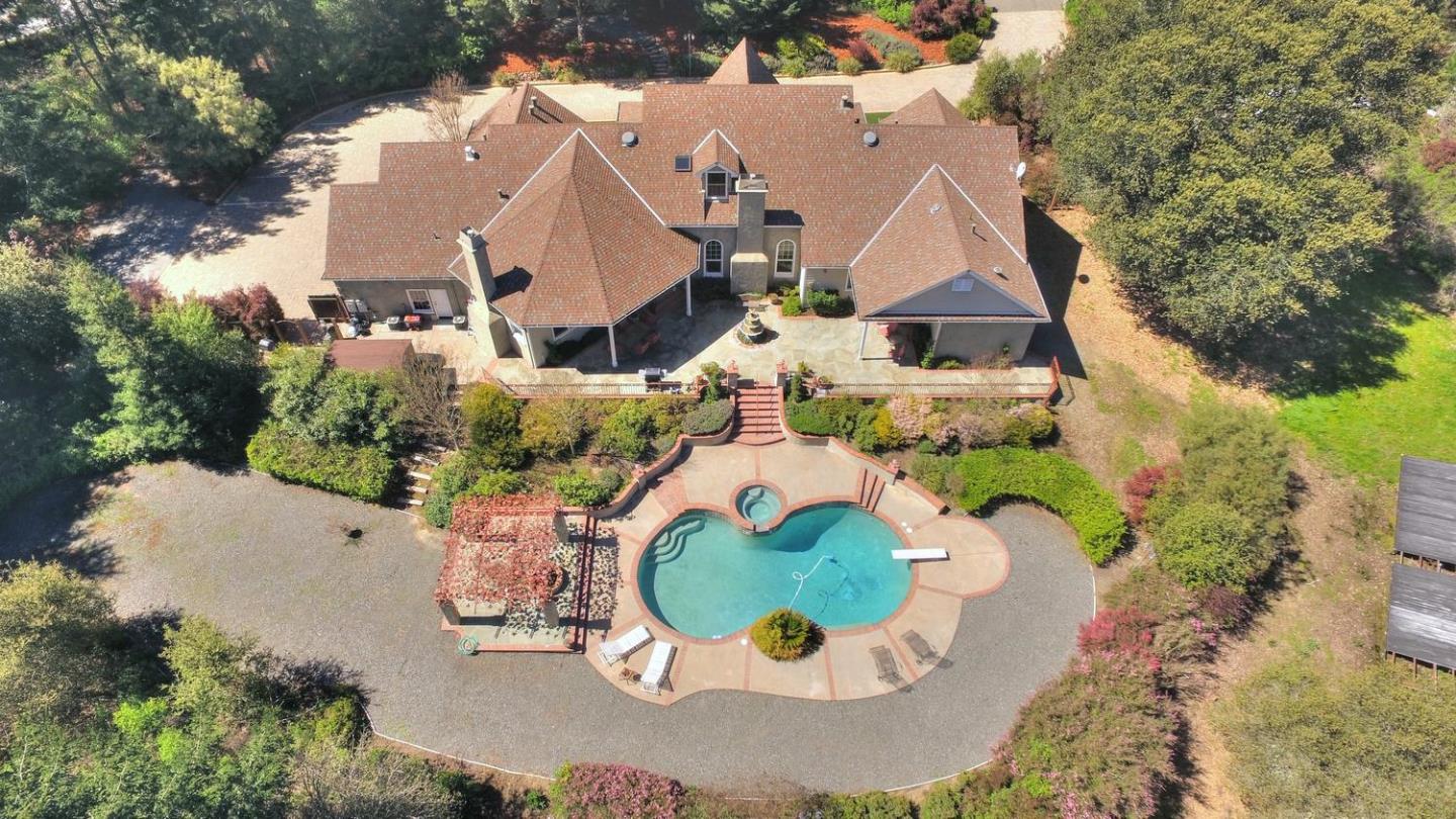 22219 Summit Road Los Gatos, CA 95033 - Photo 28 of 34 an aerial view of a house with a swimming pool and outdoor seating
