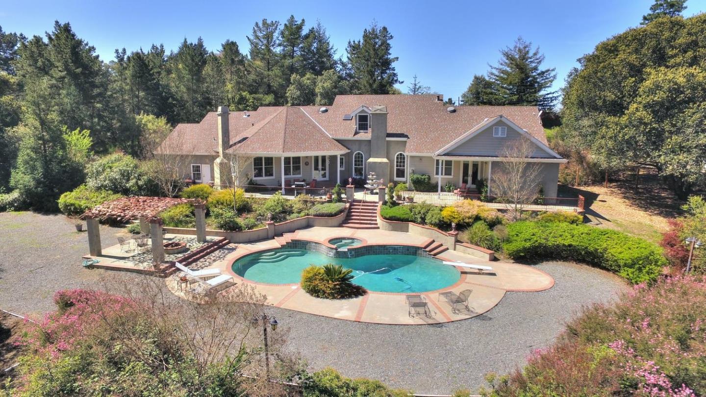 22219 Summit Road Los Gatos, CA 95033 - Photo 3 of 34 a view of a house with swimming pool and a yard