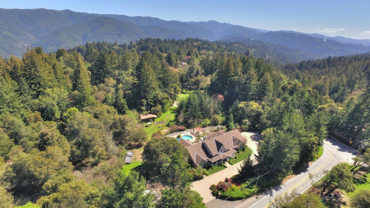 22219 Summit Road Los Gatos, CA 95033 - Photo 34 of 34 an aerial view of green landscape with trees houses and mountain view