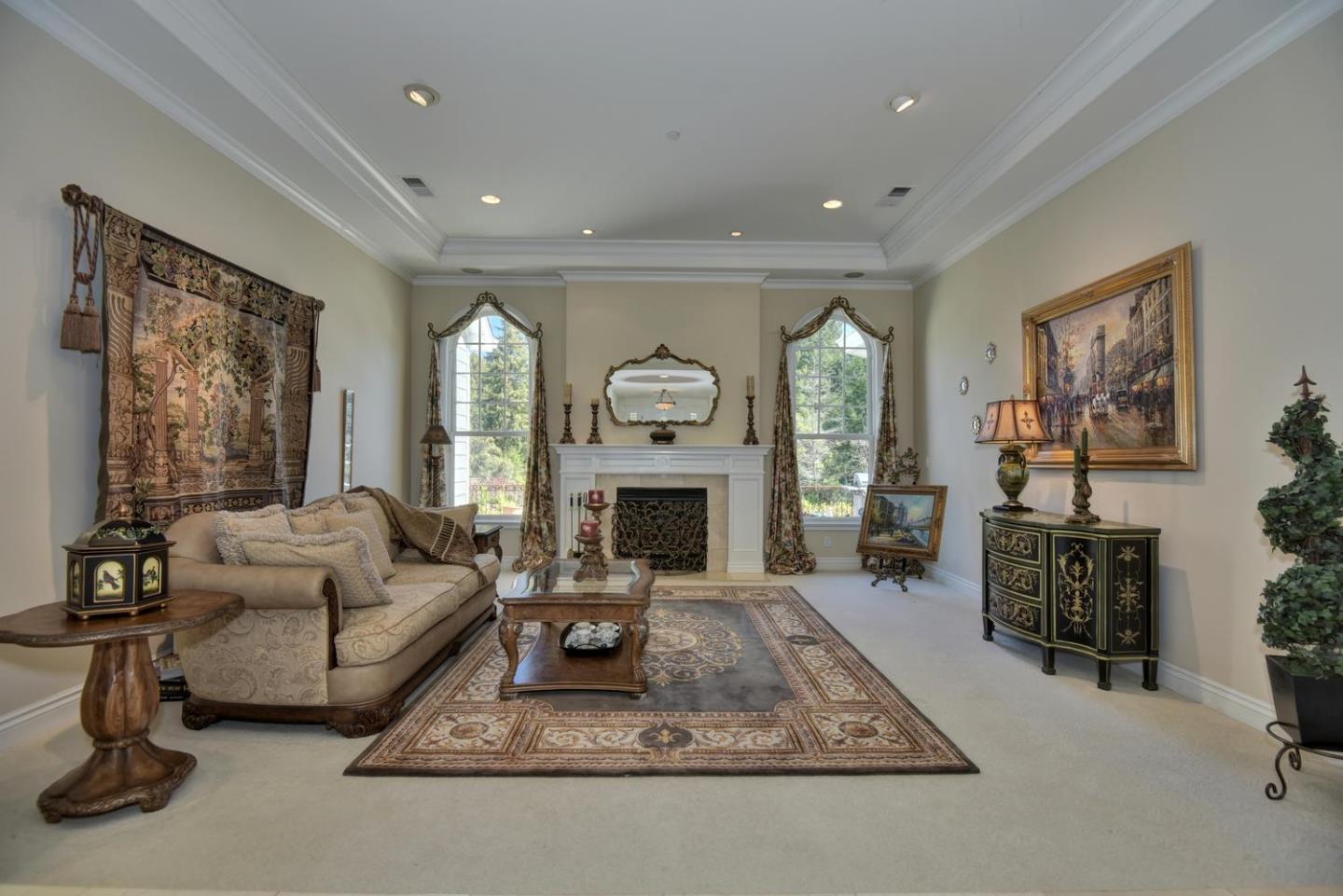 22219 Summit Road Los Gatos, CA 95033 - Photo 5 of 34 a living room with furniture a fireplace and a large window