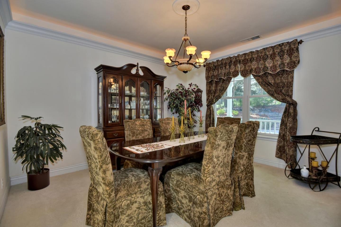 22219 Summit Road Los Gatos, CA 95033 - Photo 8 of 34 a view of a dining room with furniture and chandelier