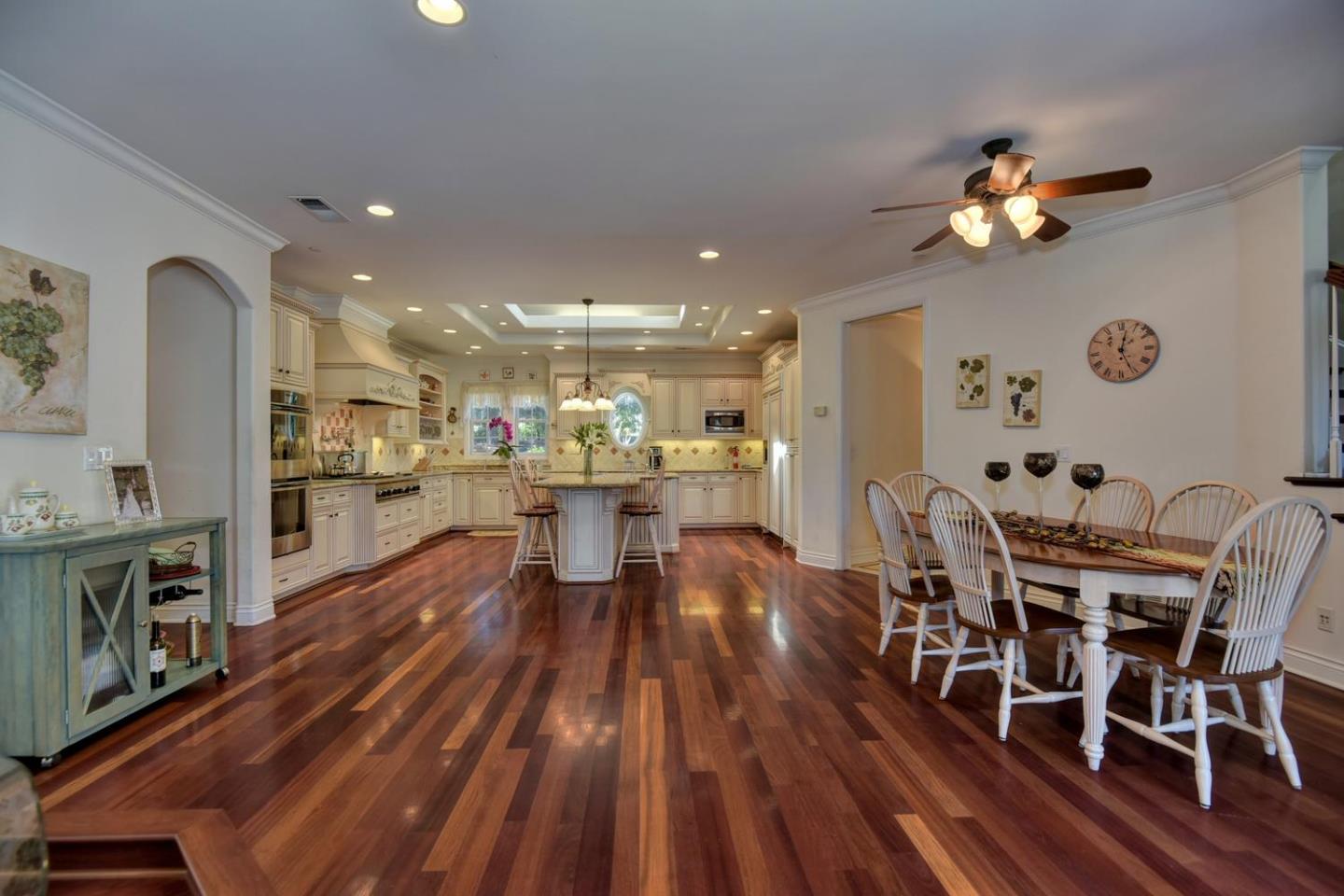 22219 Summit Road Los Gatos, CA 95033 - Photo 9 of 34 a view of a dining room with furniture and wooden floor