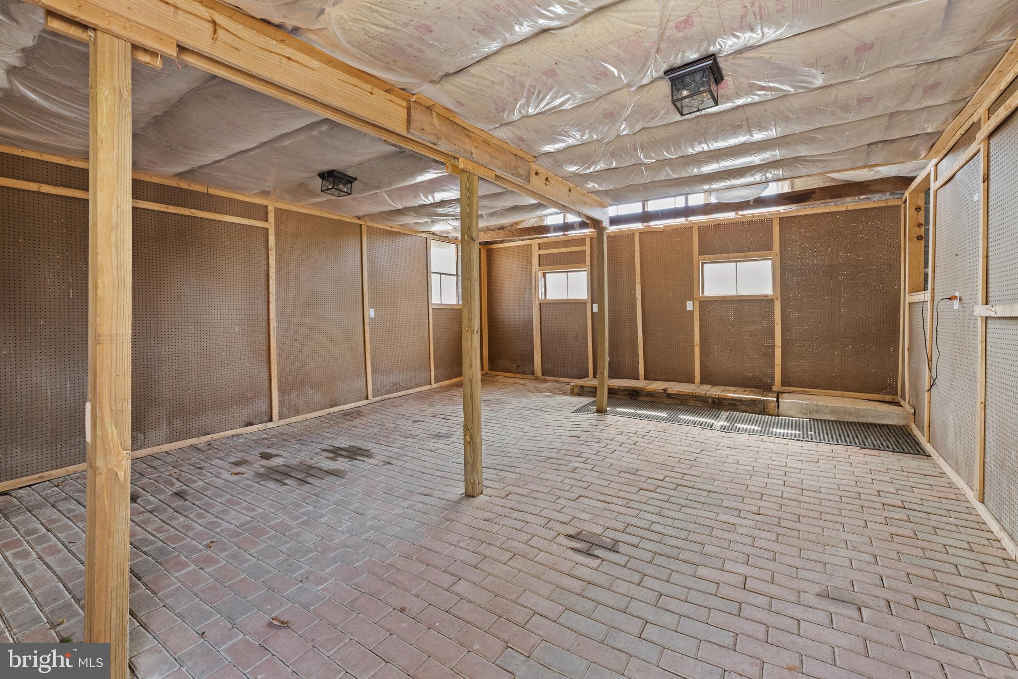 989 Swover Creek Road Edinburg, VA 22824 - Photo 116 of 132 a view of an empty room with wooden floor