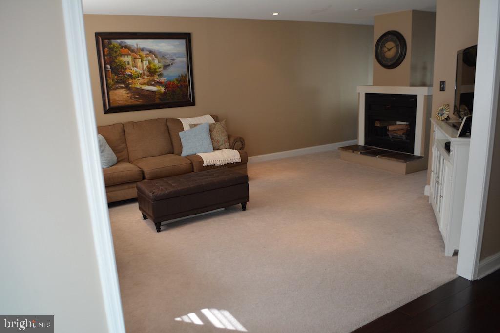 39 Sullivans Bridge Road Wayne, PA 19087 - Photo 11 of 29 Living Room with see through fireplace to Dining
