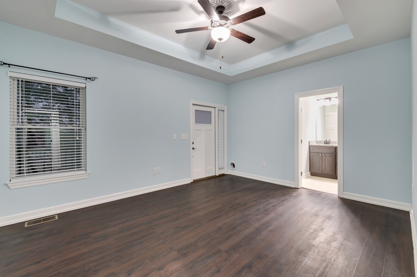 105 Lake Wood Road Lebanon, TN 37087 - Photo 13 of 34 a view of an empty room with wooden floor and a window