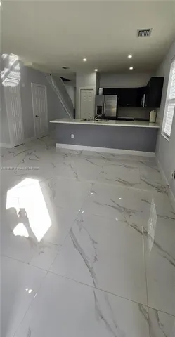 a view of a chandelier fan