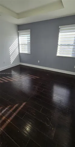 a bathroom with a toilet a sink and shower