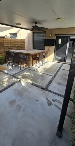 an aerial view of a house with a garden