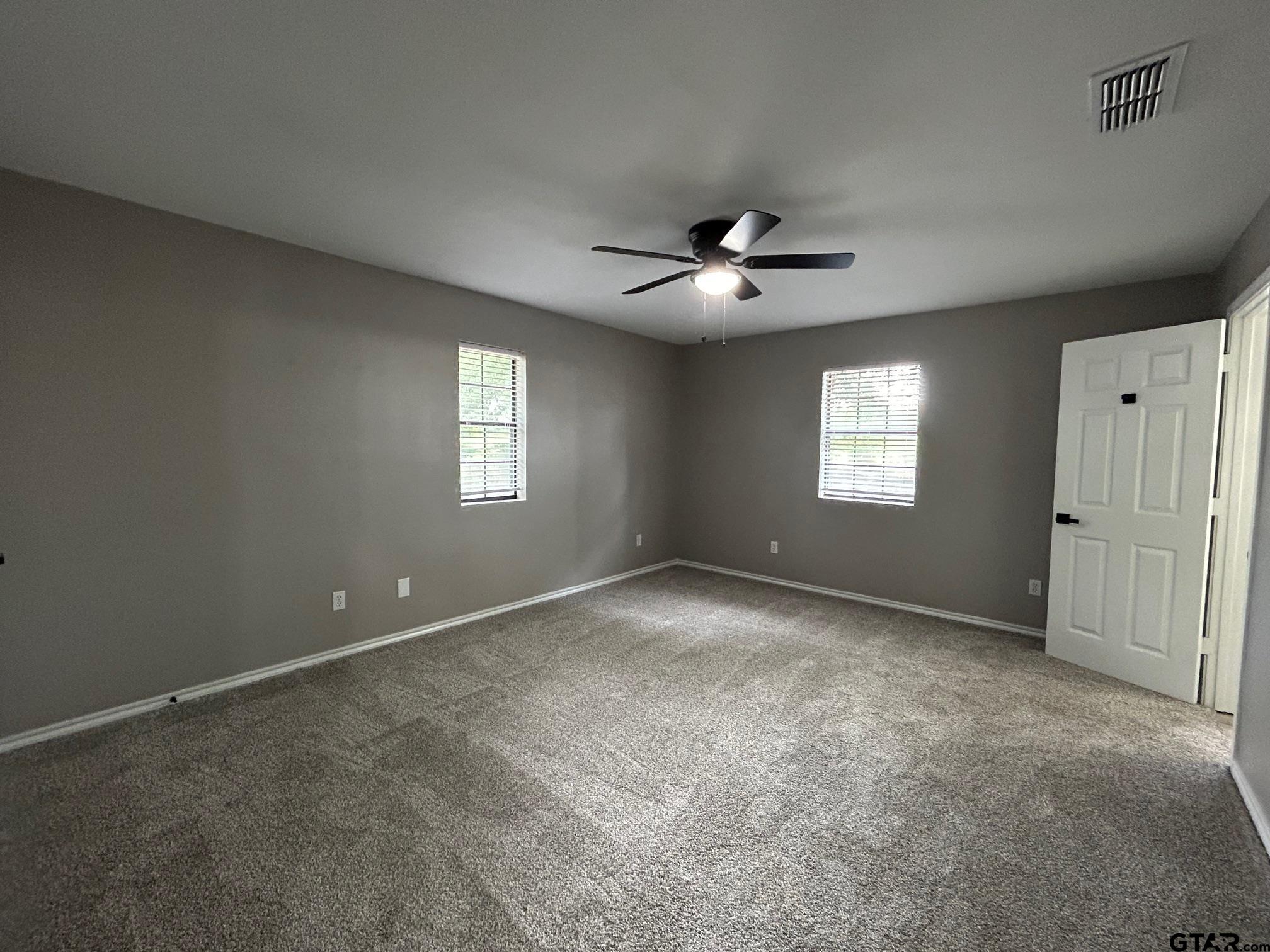 10052 Lakeshore Tyler, TX 75709 - Photo 20 of 28 a view of an empty room with a window